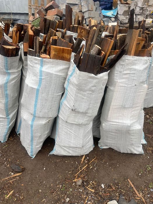 Дрова в мешках 1200тг