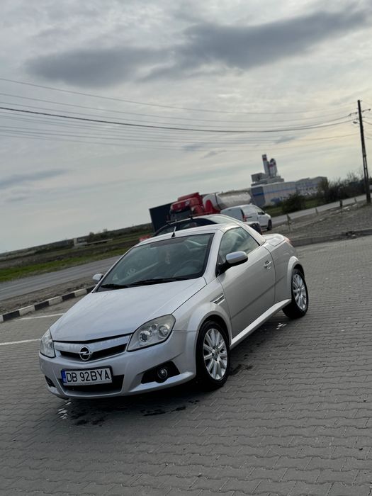 Vând Opel Tigra.