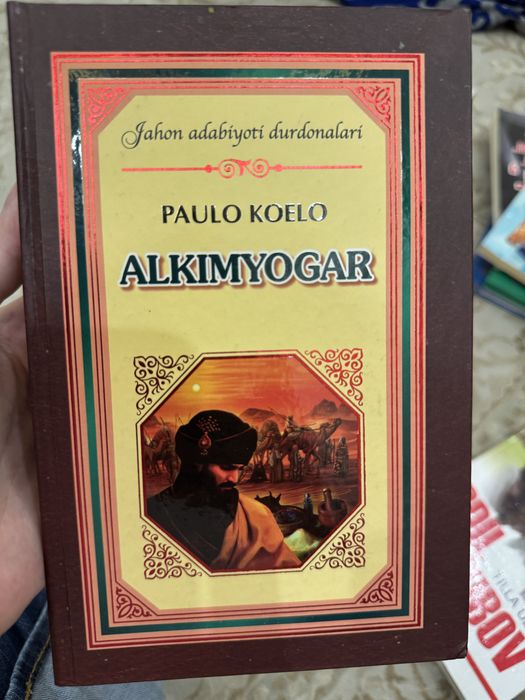 Китоб Алкимёгар Пауло Коэло
