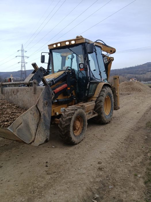 Închirieri, buldoexcavator si basculanta  20T