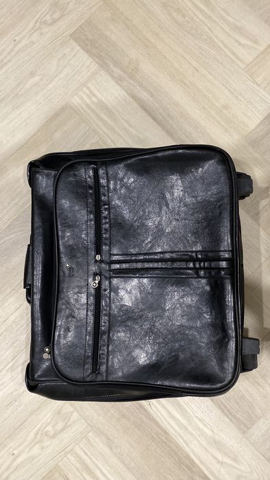 Дорожная кожаная сумка