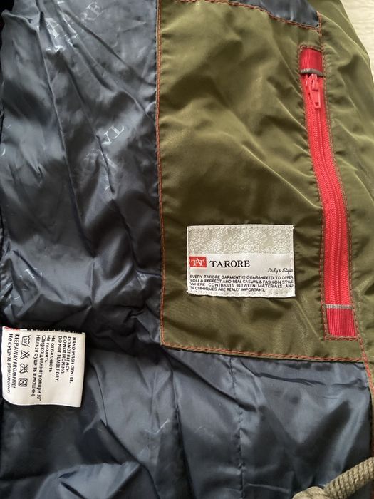 Зимний пуховик енот