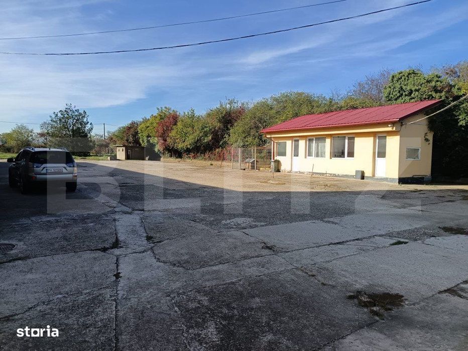 Cladire birouri , hala de productie, spatii depozitare, parcare si ter