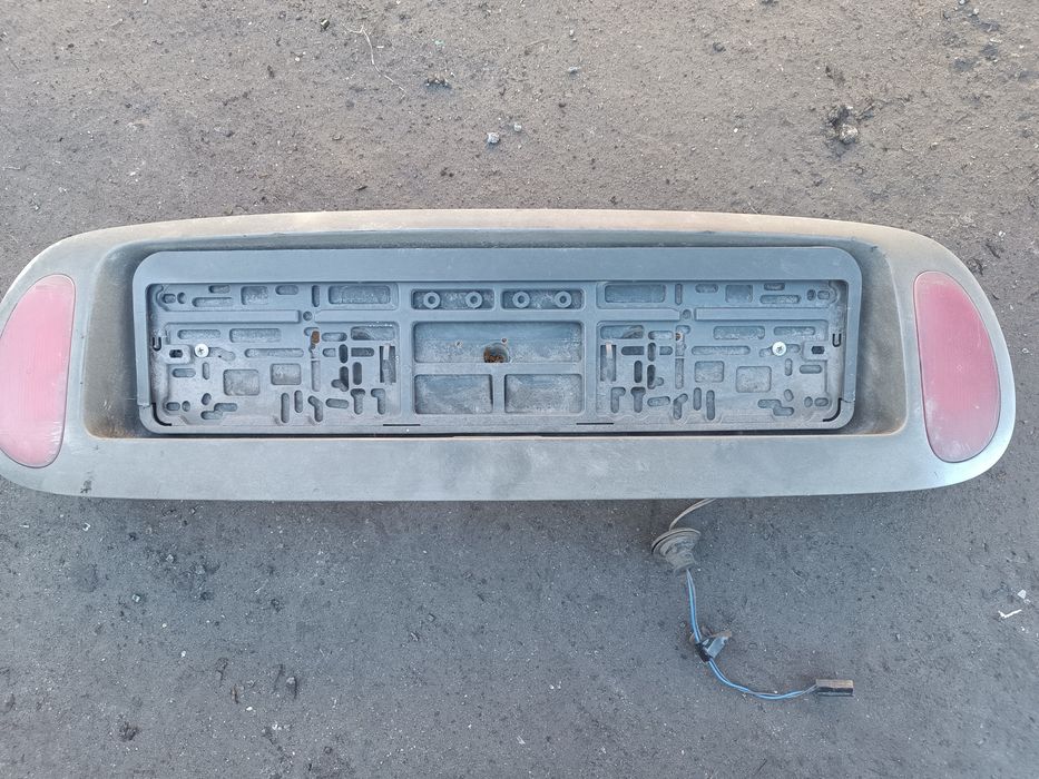 Бленда ( накладка двери багажника) Рено сценик