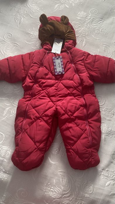 Продам детский комбинезон новый