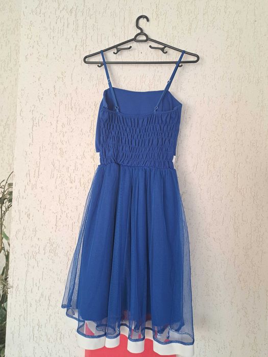 Официални рокли.