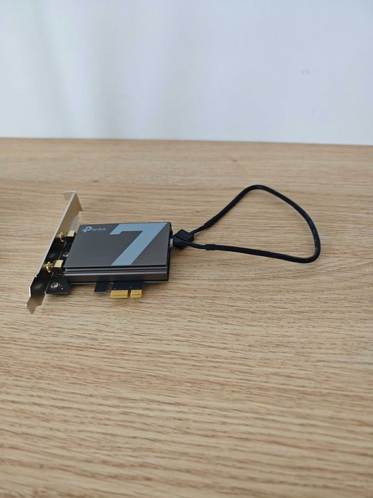 Продавам TP-LINK TBE550E WiFi 7 pci-e adapter.