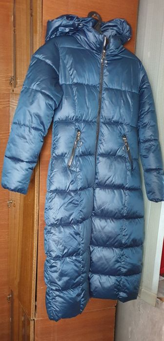 Продам женский пуховик.