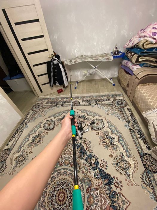 Спининг новый 10.000