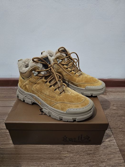 Зимние ботинки марки Camel.