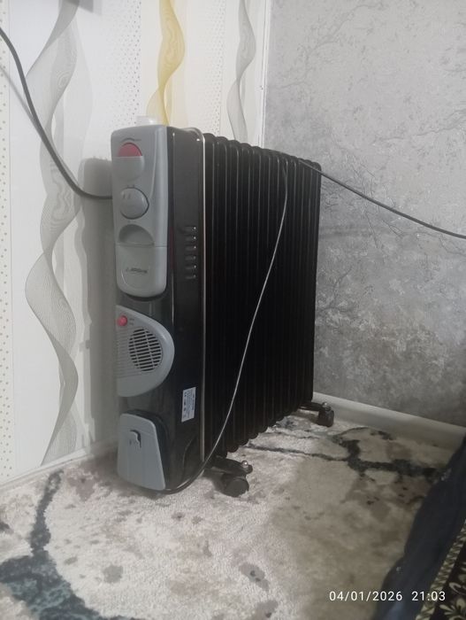 Moyli radiator 12 ta qovurgali   Xolati yangidek ..