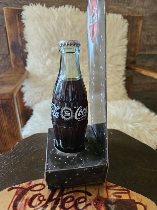 Sticlă Coca-Cola