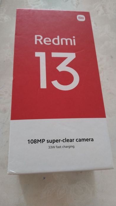 Новый телефон в упаковке