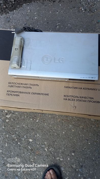 Видеомагнитофон  LG DVD/CD плейер.