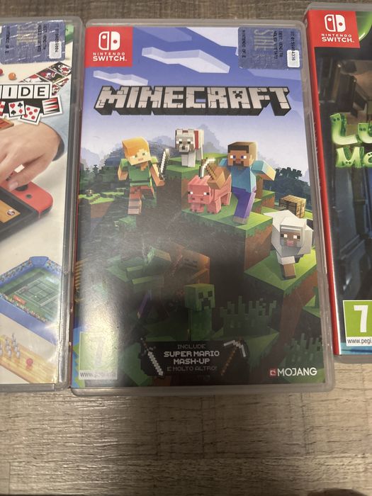 Vand nintendo switch+ accesori si 10 jocuri