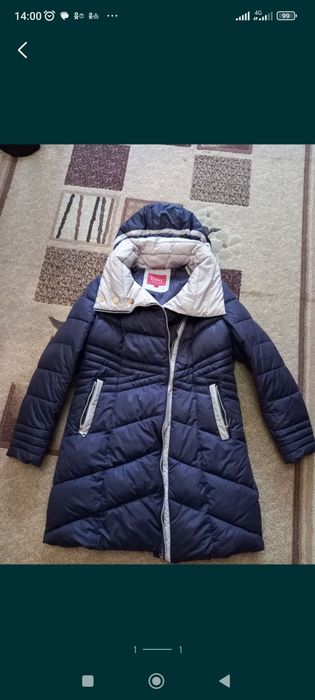 Продам пуховик 8000тенге