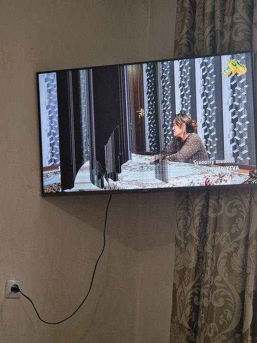 Artel 43 talik  smart tv  Bu  ekrani singan