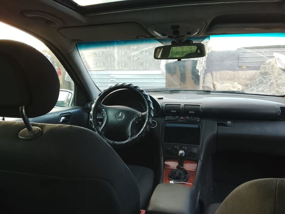 Мерседес Бенц W203