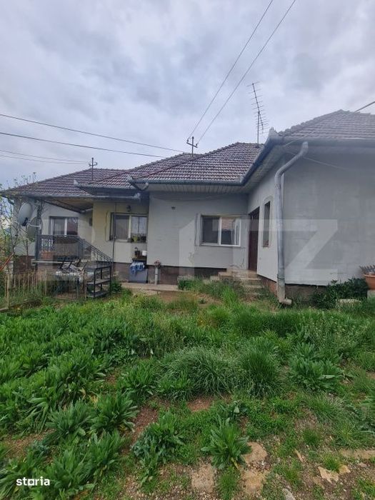 Casa individuala si 5.500 mp de teren intravilan, loc. Sanpaul, Cluj