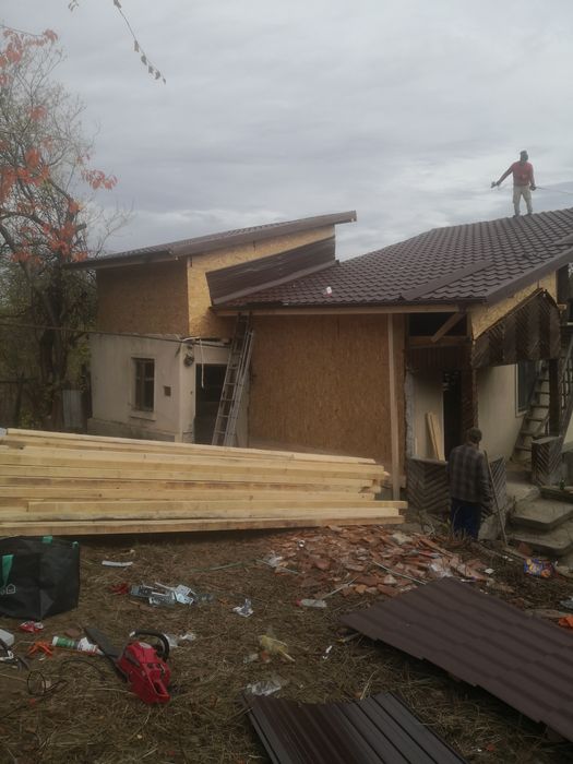 Reparatii acoperis montaj tigla metalica mansarde construcții