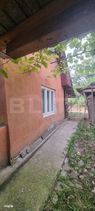 Casa cu doua corpuri