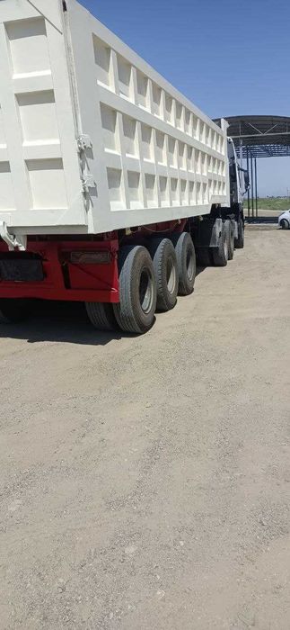 HOWO ТЯГАЧ заводской газ с прицепом  грузоплдъёмность 60 тонна