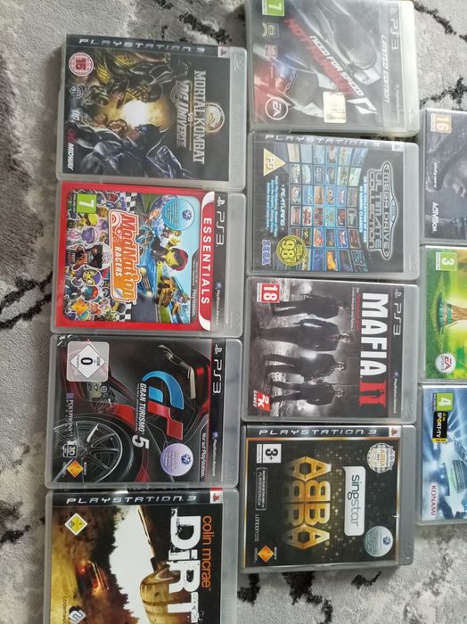 PlayStation 3  + 3 manete și jocuri