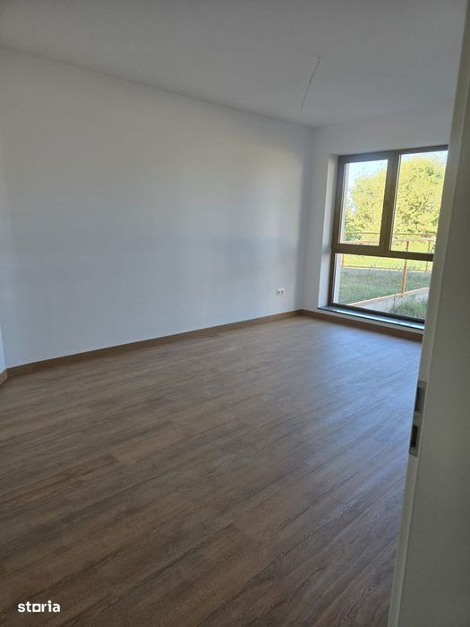 Apartament cu 2 camere , grădină 190mp + parcare
