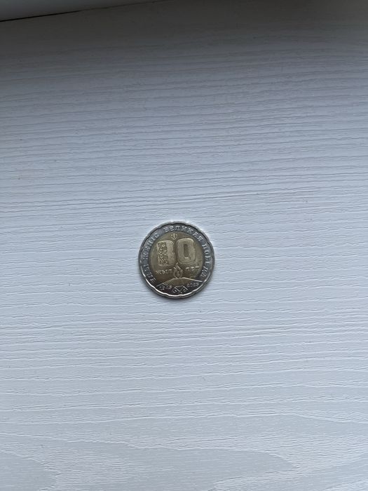 Продам монетку 200тг