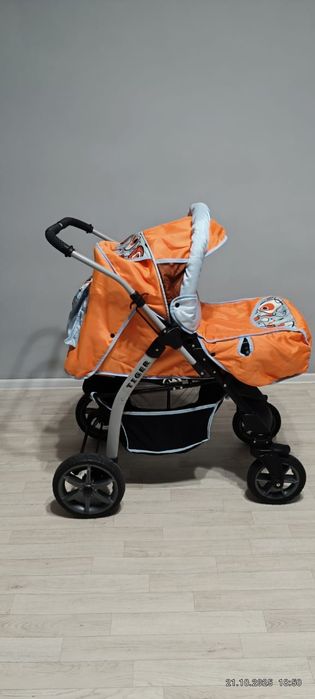 Коляска тигер многофуцанальны