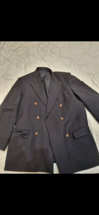 Пиджак двубортный совершенно новый.