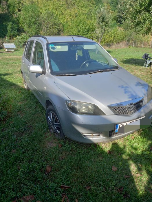 Vând Mazda 2  an 2004
