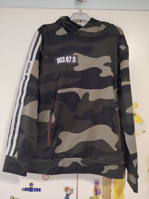 Bluza camuflaj WOXO băieți, mărime 146–152, foarte bună, 15 RON

Bluza