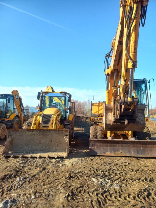 Услуги Экскаватора-погрузчика. Звоните .