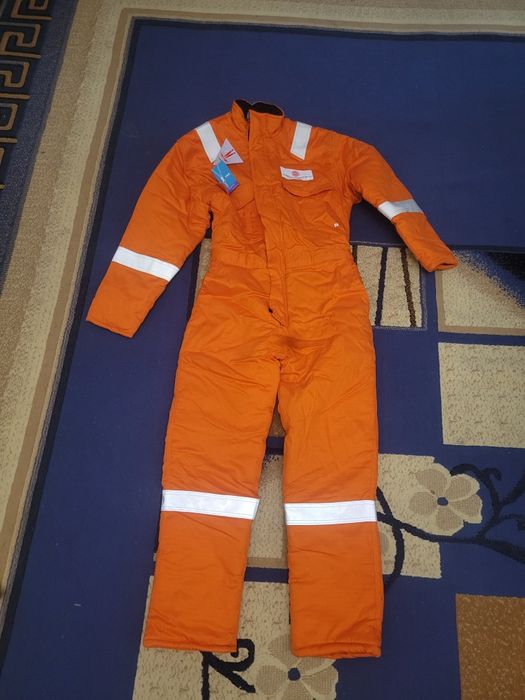 Зимний комбинезон новый
