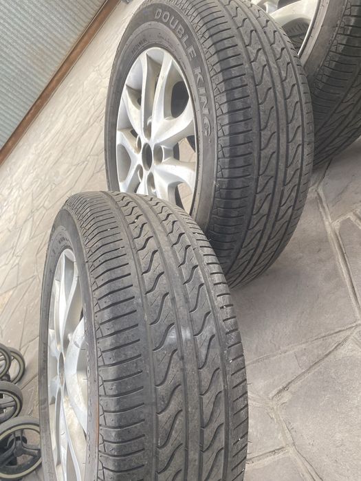 Продам летние шины с дисками 215/60 R16