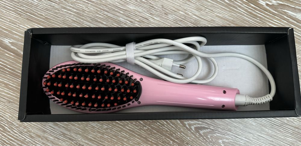 Електрическа четка за изправяне на коса