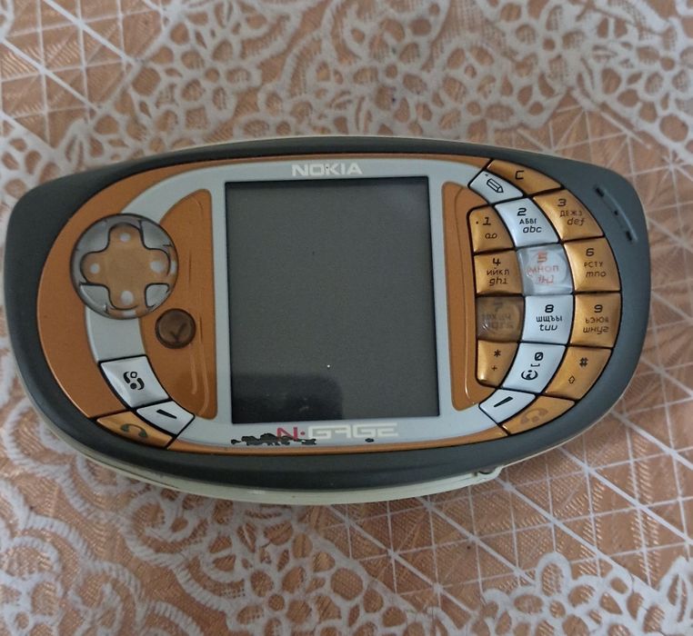 Нокияа  телфон model Gage QN orginal  игравой