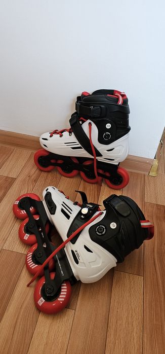 Роликовые коньки