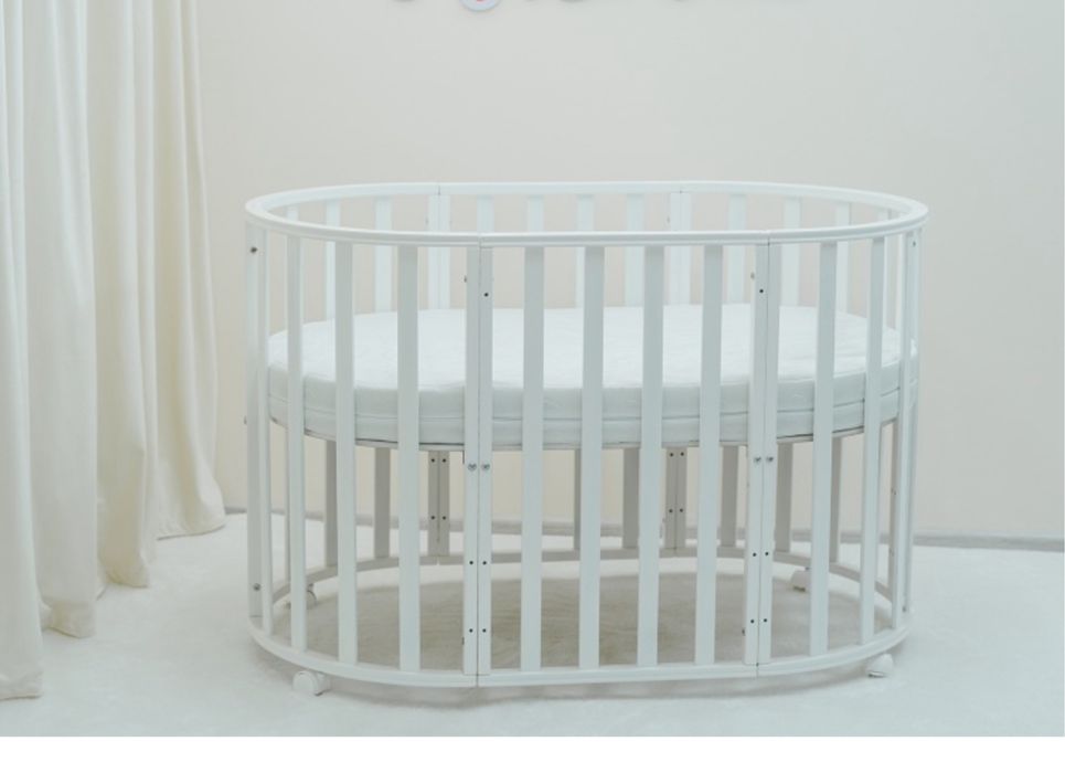 кроватка -трансформер с поперечным маятником 9 в 1.