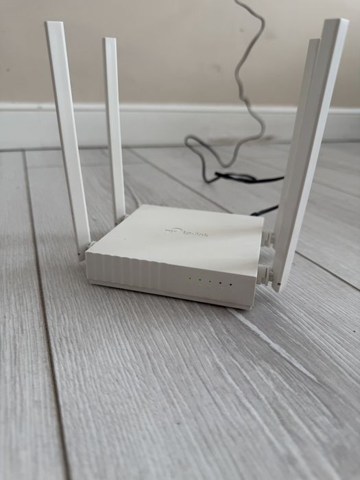 Продам Wi-Fi роутер TP-Link Archer C24 AC750