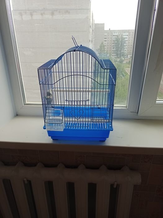 Продам  клетку для попугая.