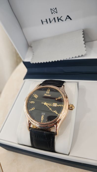 Золотые часы Ника