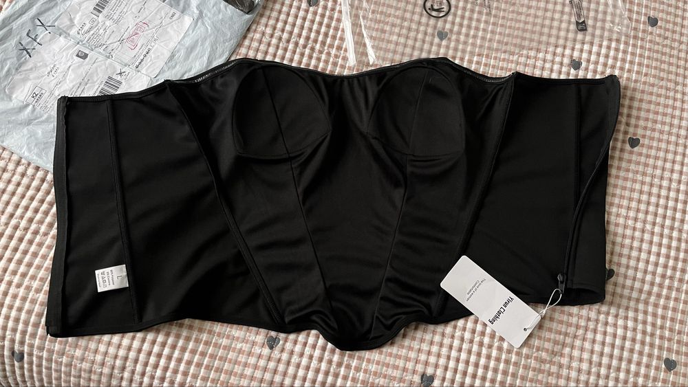 Продам корсет новый