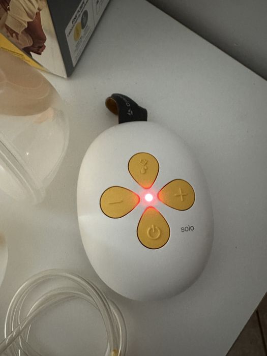 Medela Solo Hands-Free + 2 бр допълнителни закупени чашки 24 мм