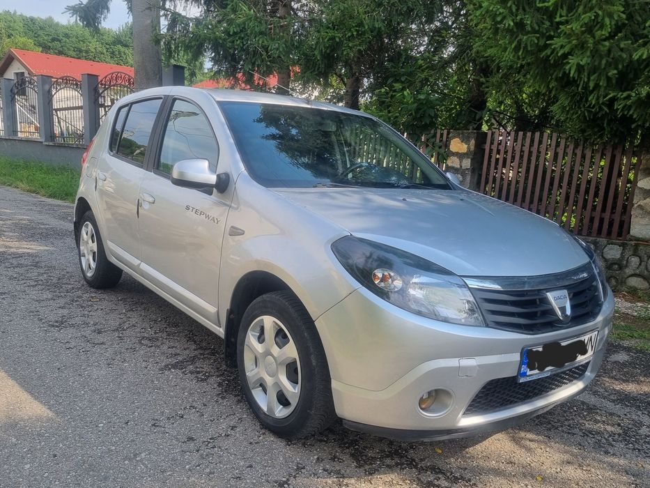 Sandero 1.4mpi  ,Aer condiționat