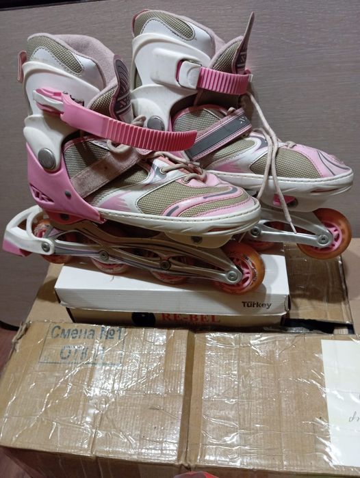 Роликовые коньки