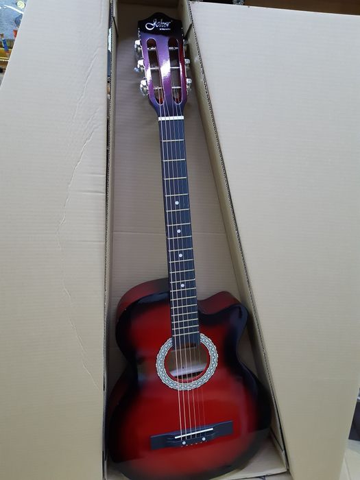 Продам гитару 38размер