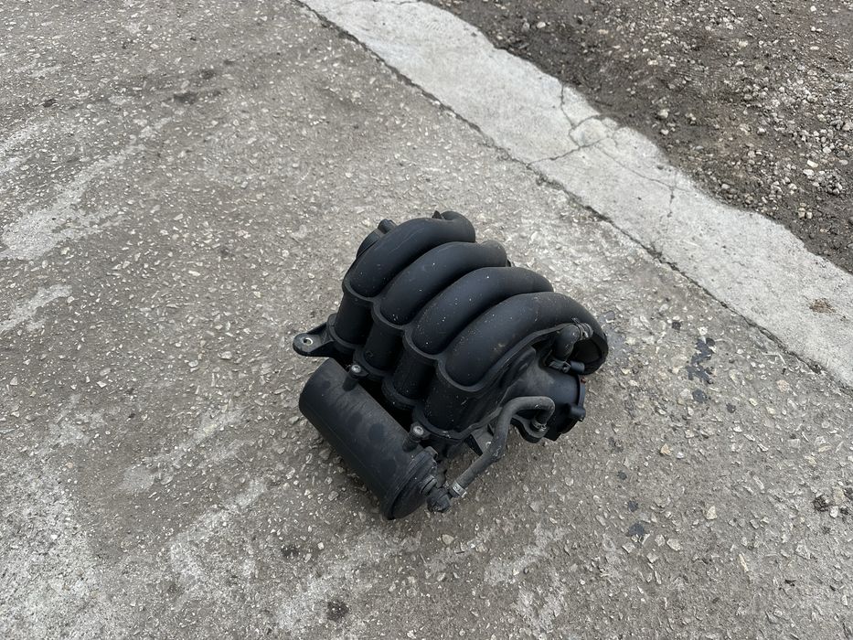 06B 133 210 BJ всмукателен колектор за Ауди А4 B7 2.0i