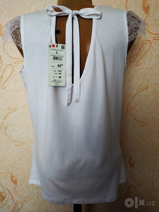Кофточки жен. белого цвета Раз. 46